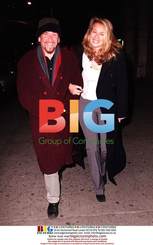 Todd Rundgruin and Fredrique Leaving Restaurant