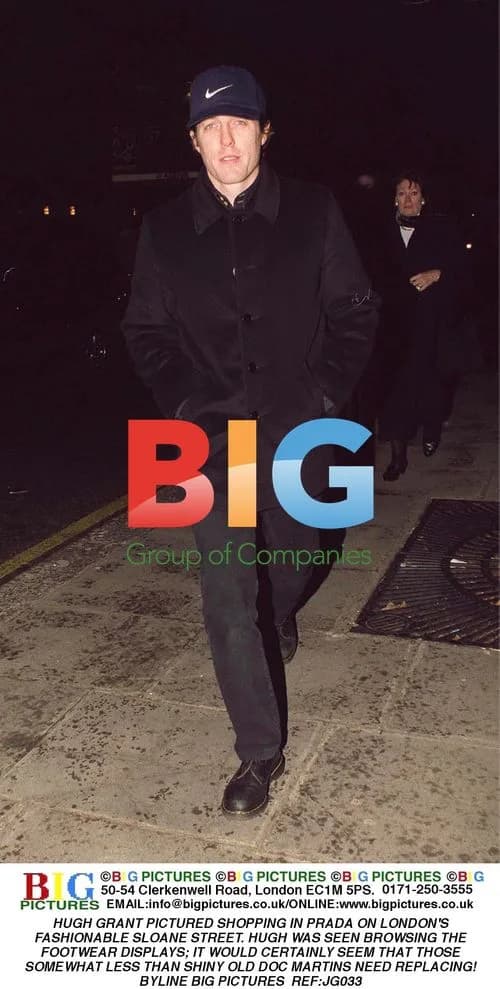 Hugh Grant Shops at Prada in London