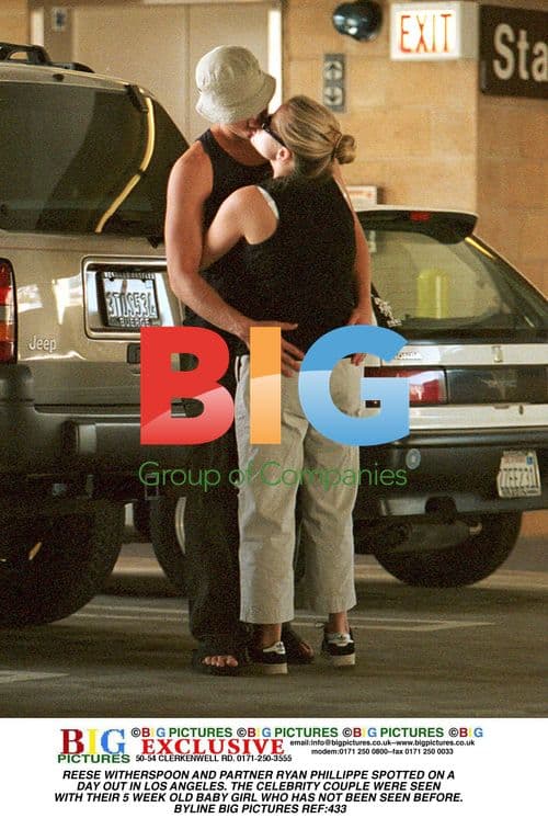 Reese Witherspoon and Ryan Phillippe with newborn