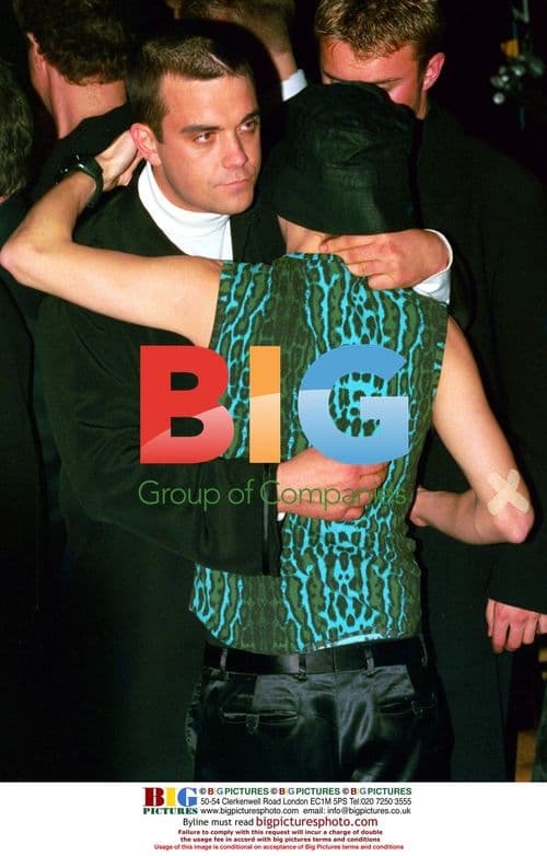 Robbie Williams with his BRIT Awards