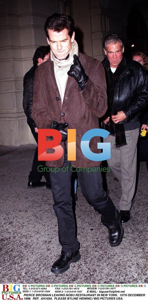 PIERCE BROSNAN LEAVING NOBU IN NEW YORK