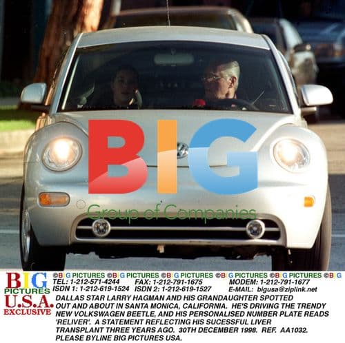 Larry Hagman and Granddaughter in VW Beetle