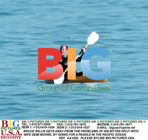 Bruce Willis Paddles in the Pacific