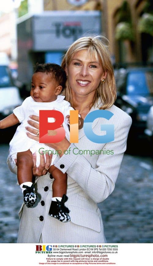 Former Olympic swimmer Sharon Davis and her baby