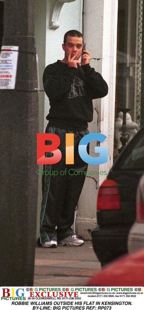 Robbie Williams Spotted Outside Flat