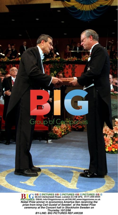 Amartya Sen receives Nobel Prize from King Carl Gustaf