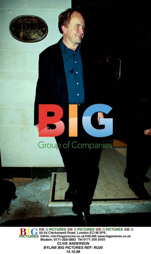 Clive Anderson in Blue Suit and Shirt