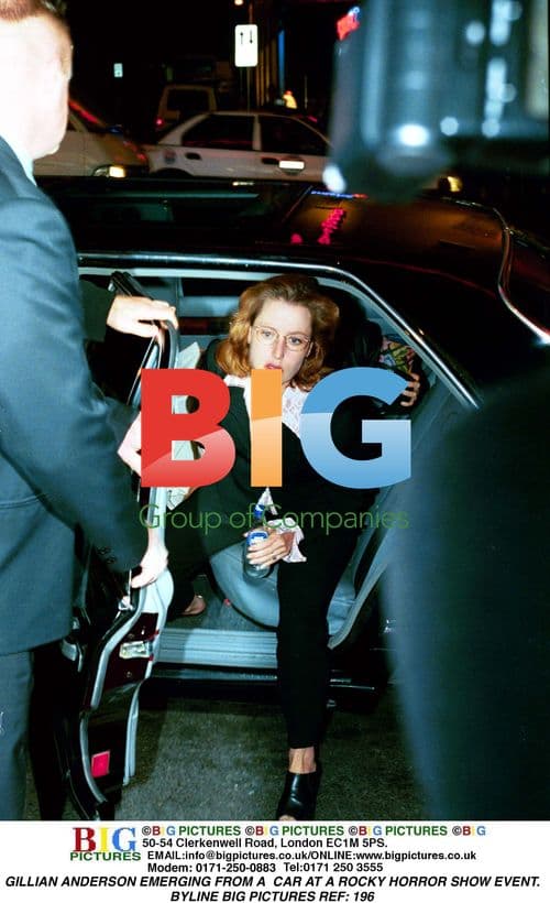 GILLIAN ANDERSON EMERGING FROM CAR AT ROCKY HORROR SHOW EVENT