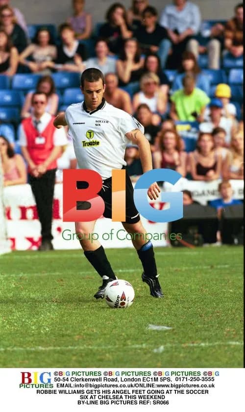 Robbie Williams Plays at Soccer Six
