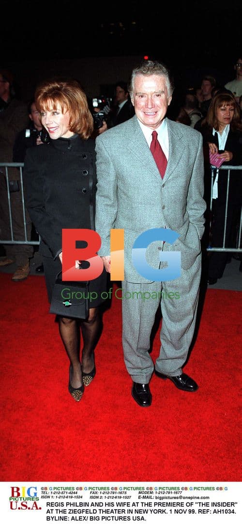 Regis Philbin and wife at "The Insider" premiere