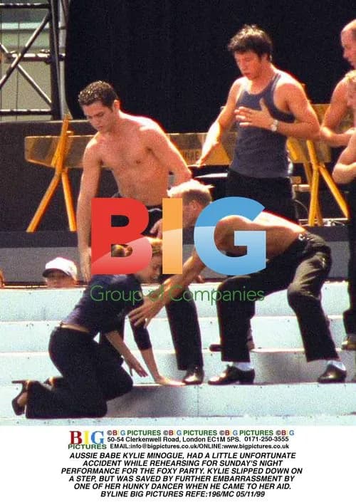 Kylie Minogue Slips on Stage