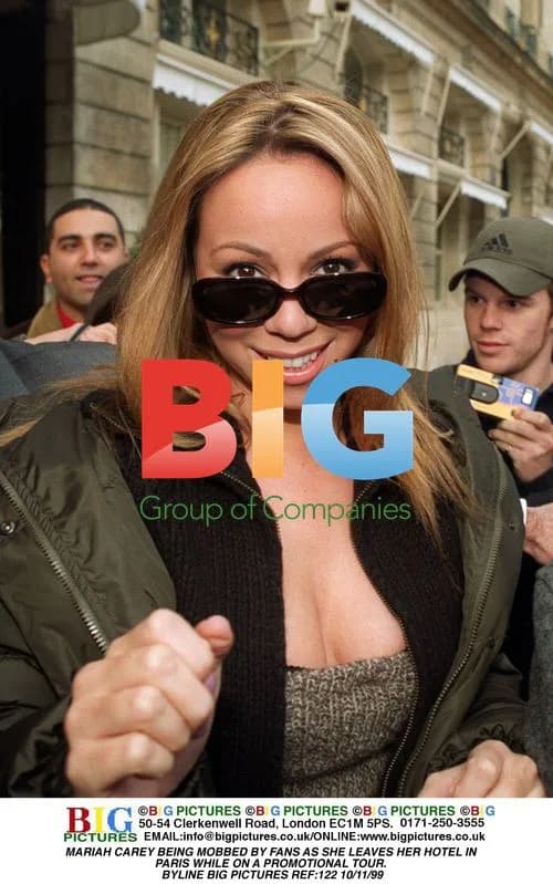 Mariah Carey Mobbed by Fans in Paris