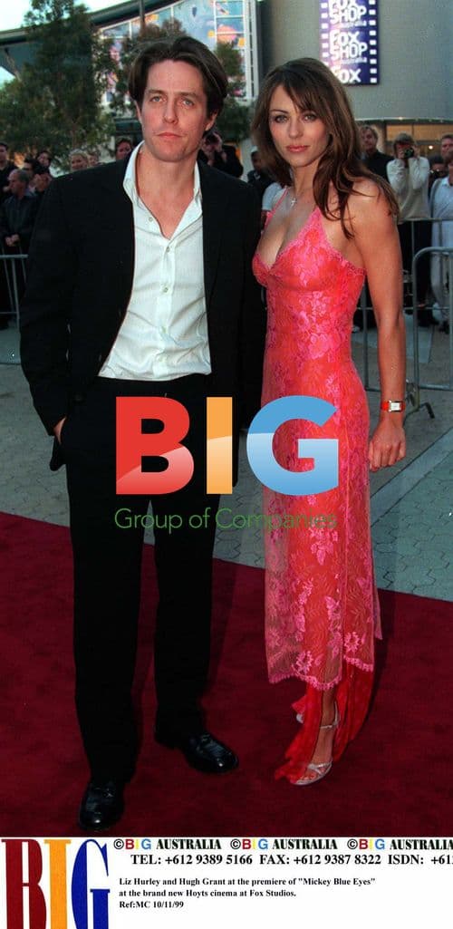 LIZ HURLEY AND HUGH GRANT AT MOVIE PREMIERE