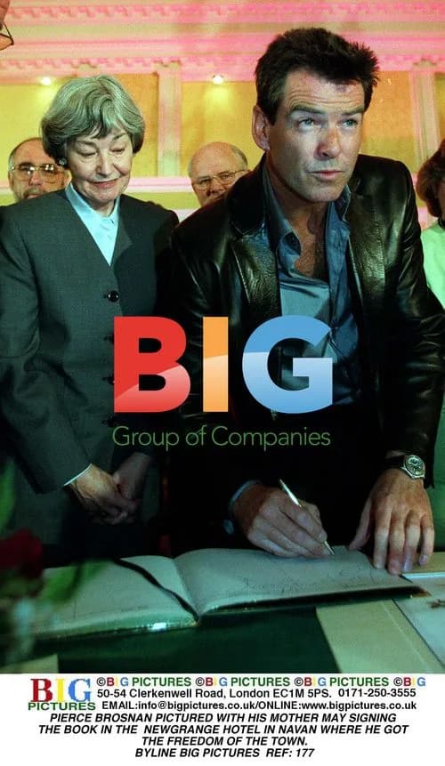 Pierce Brosnan Pictured with Mother Signing Book