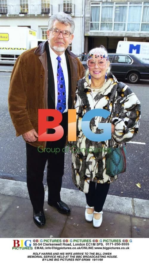Rolf Harris and wife arrive at Bill Owen memorial