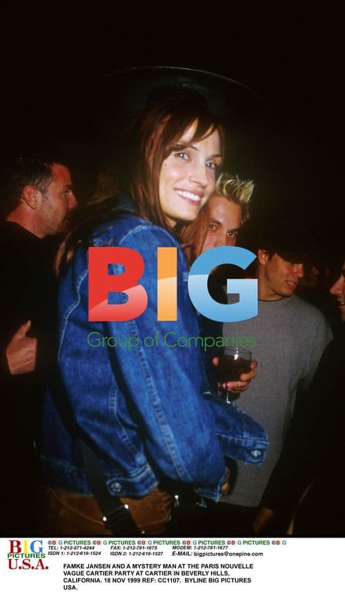 Famke Jansen and mystery man at Cartier party