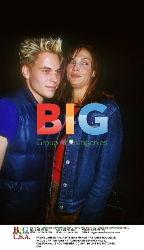 FAMKE JANSEN AND MAN AT CARTIER PARTY