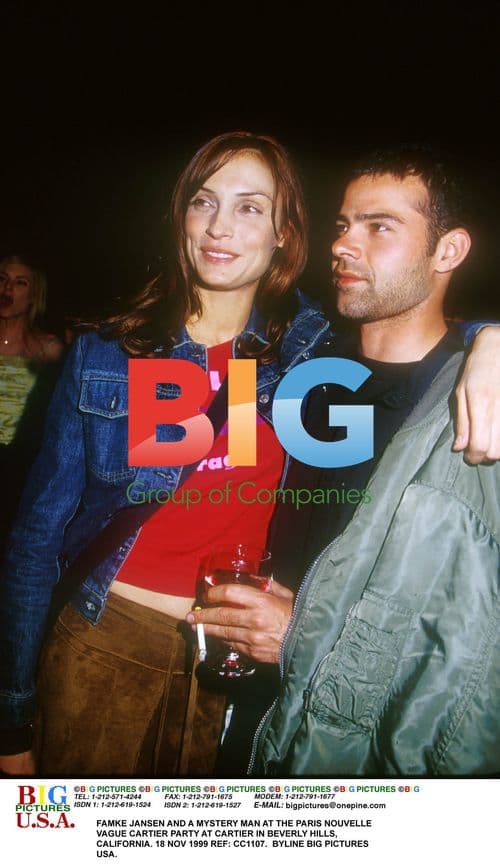 FAMKE JANSEN AND MYSTERY MAN AT CARTIER PARTY