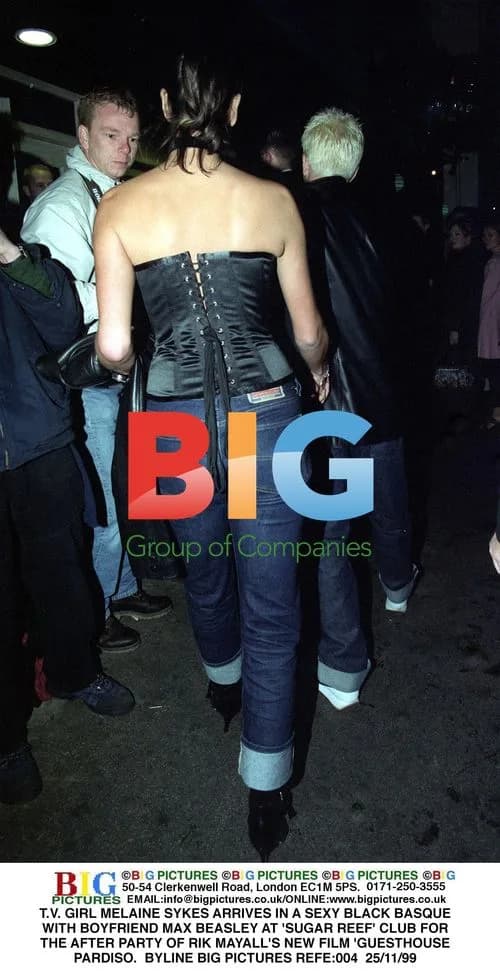 Melanie Sykes and boyfriend at club event
