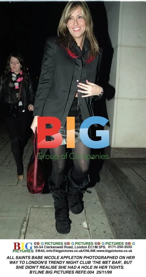 Nicole Appleton Photographed with Hole in Tights