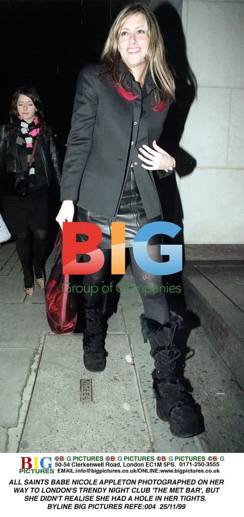 Nicole Appleton Photographed With Hole in Tights