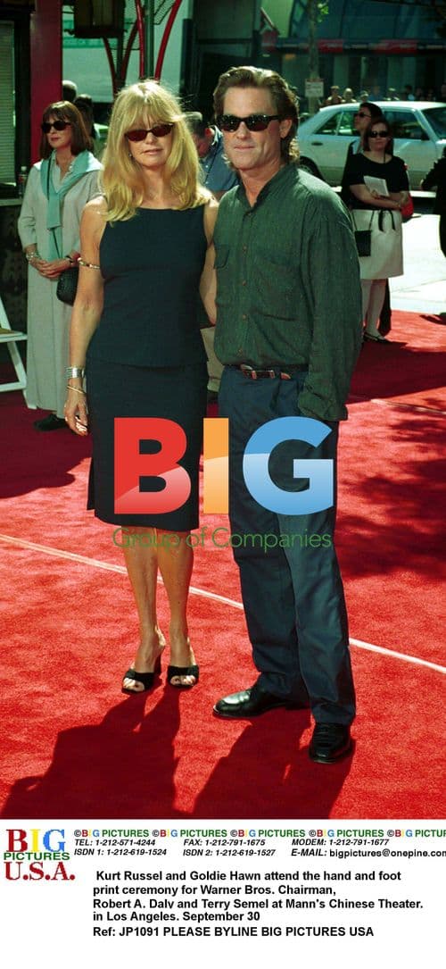 Kurt Russel and Goldie Hawn at ceremony for Warner Bros. executives