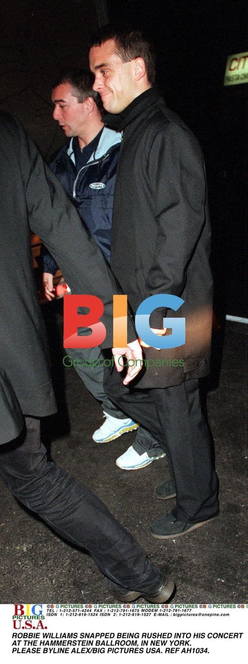 Robbie Williams Rushed to Concert in NY