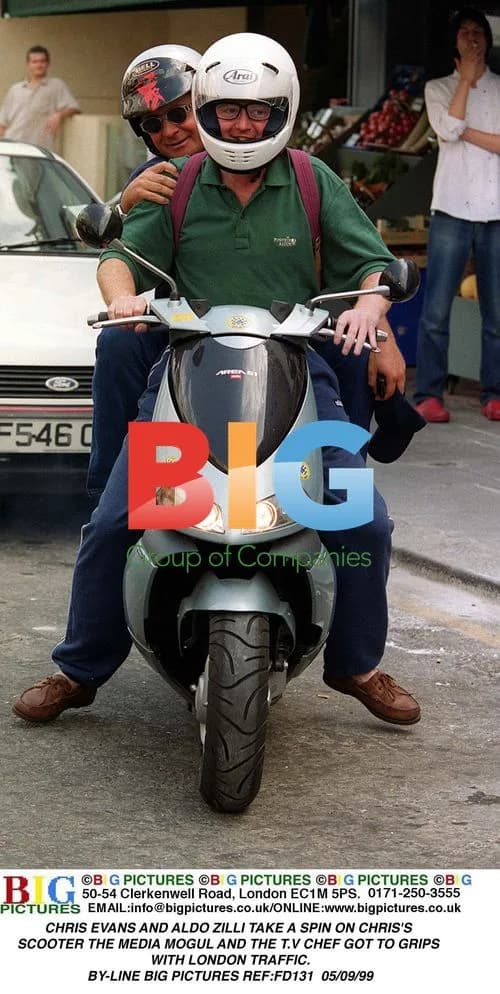 Chris Evans and Aldo Zilli ride scooter in London