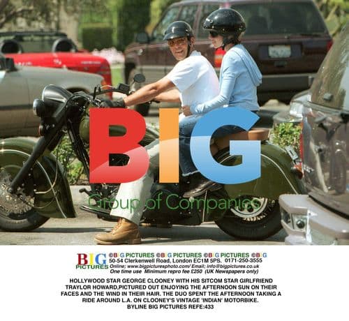 George Clooney and Traylor Howard out on motorcycle