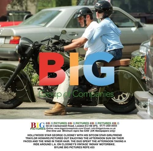 George Clooney and Traylor Howard ride bike