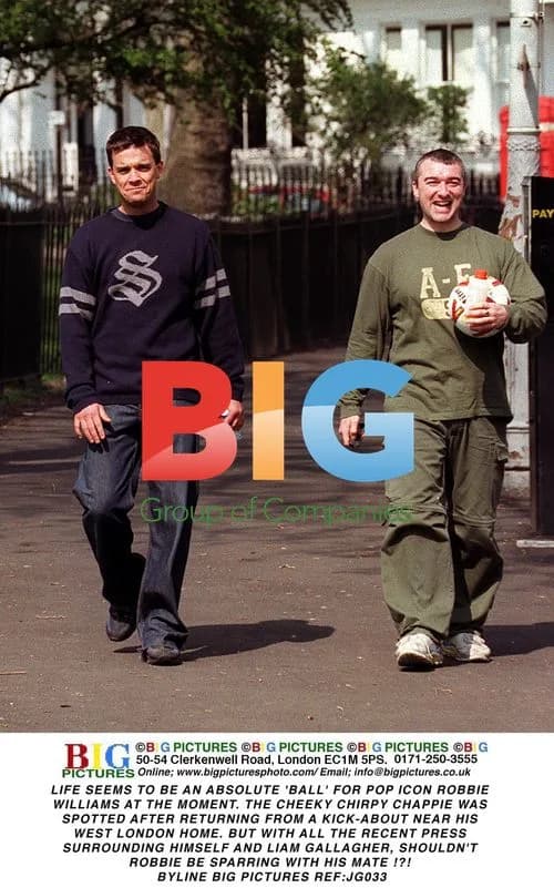 Robbie Williams spotted after football