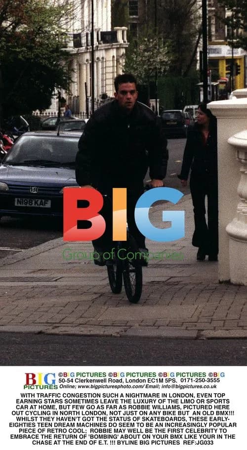 Robbie Williams Spotted Cycling on BMX in London