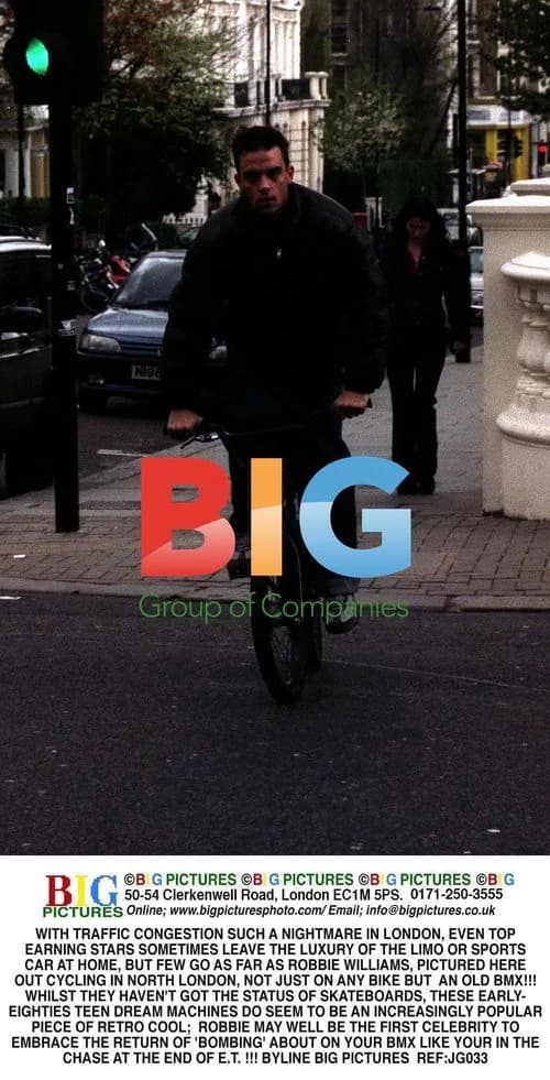 Robbie Williams Cycles on BMX Bike