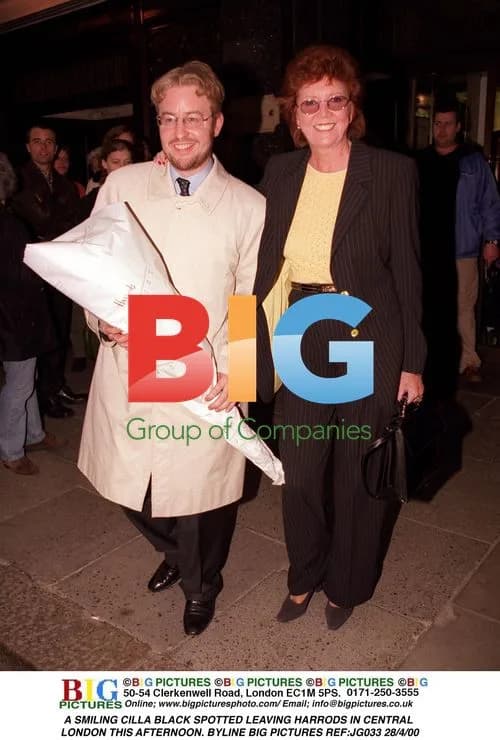 Cilla Black Leaves Harrods in London