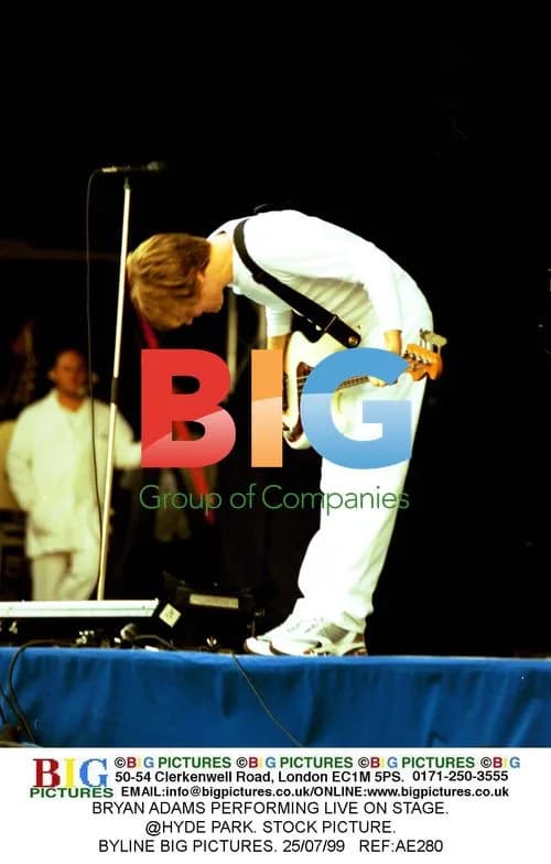 Bryan Adams Performing Live on Stage
