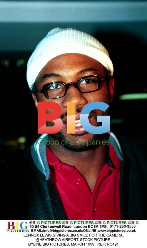 Lennox Lewis Smiling at Heathrow