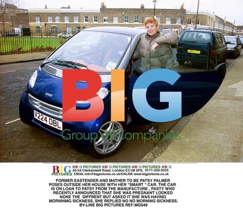 Patsy Palmer Poses With 'Smart' Car