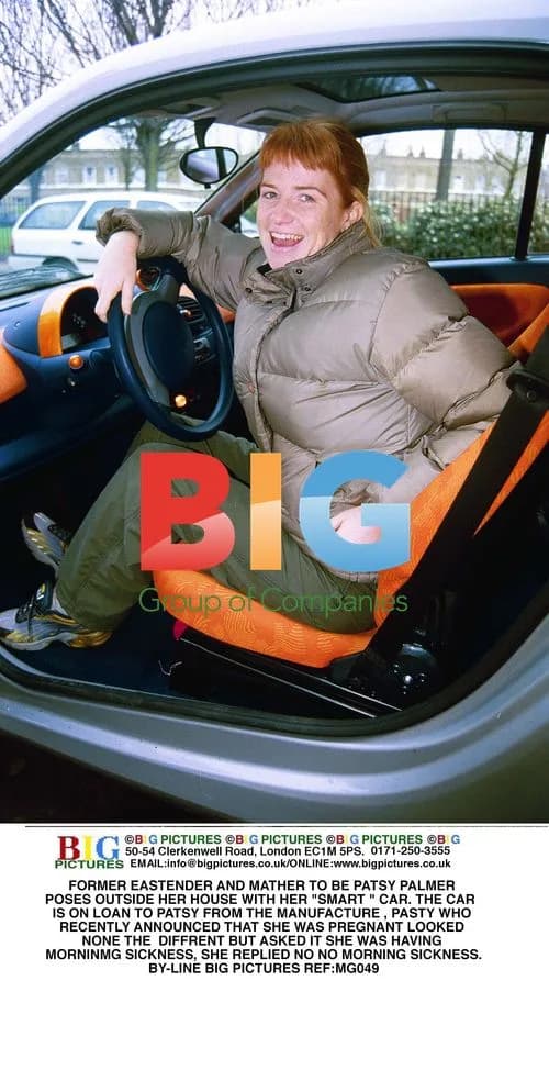 Patsy Palmer Poses with Smart Car
