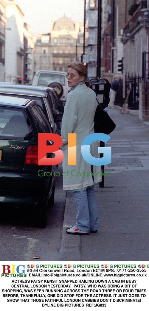 Patsy Kensit hailing a cab in London