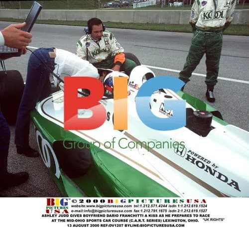 Ashley Judd Kisses Dario Franchitti Before Race