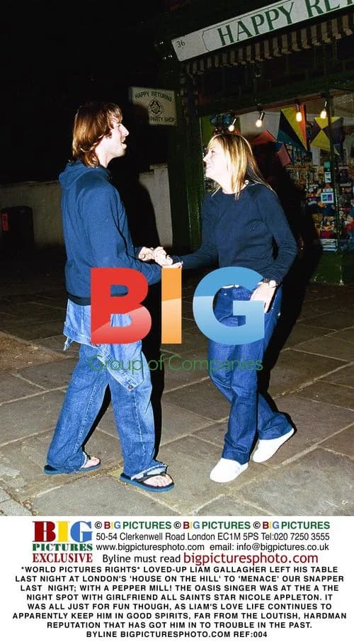 Liam Gallagher playfully menaces photographer