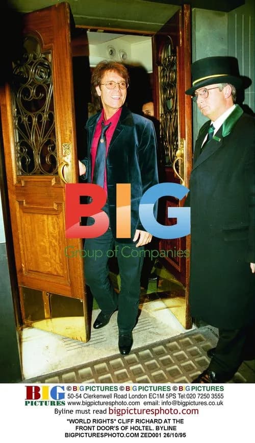 Cliff Richard at hotel front door