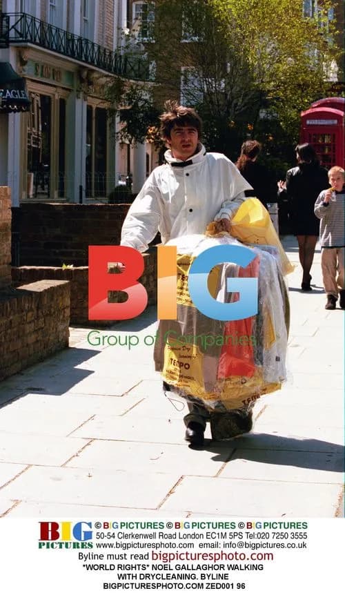 Noel Gallagher Walking with Dry Cleaning