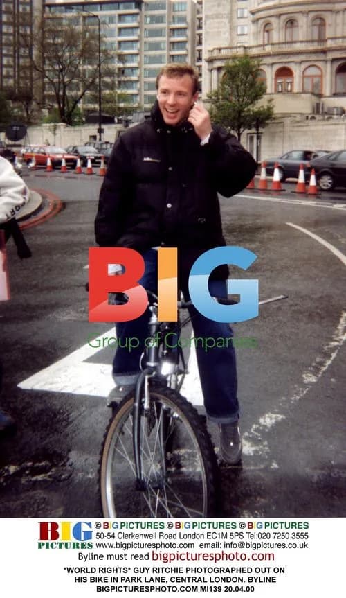 Guy Ritchie Photographed on Bike in London
