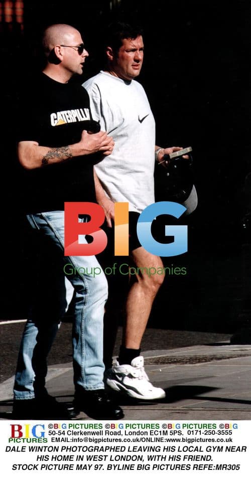 Dale Winton photographed leaving gym with friend
