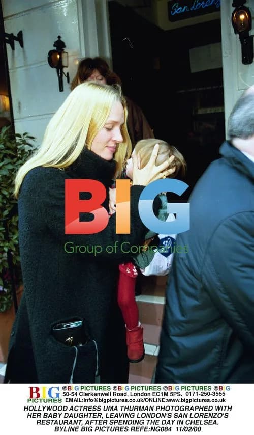 Uma Thurman with baby daughter in London