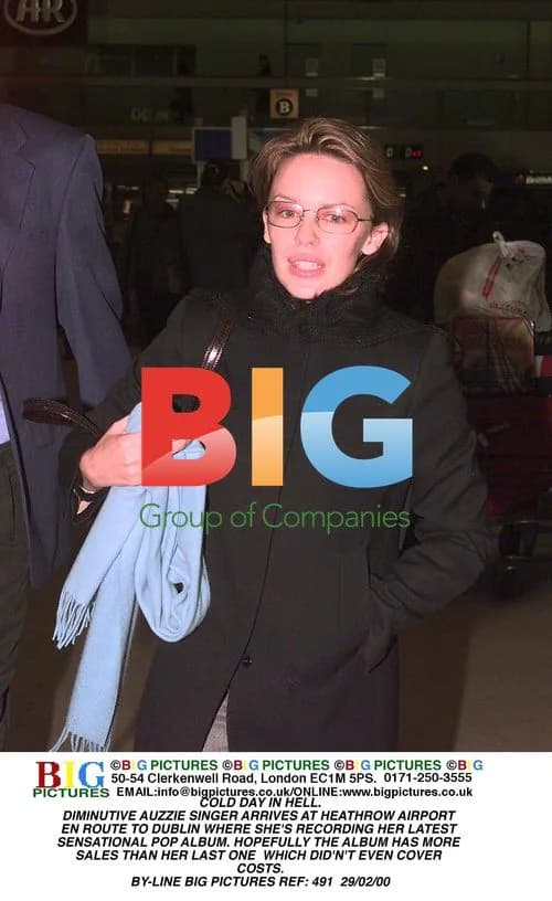 Kylie Minogue Arrives at Heathrow