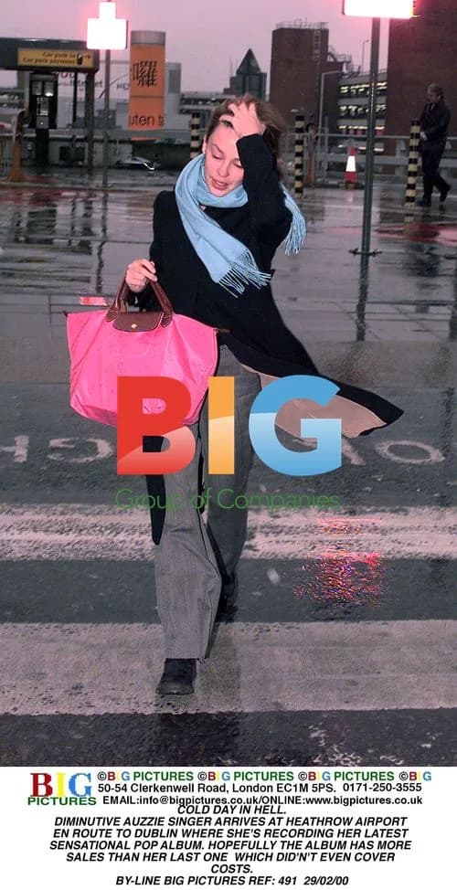 Kylie Minogue Arrives at Heathrow