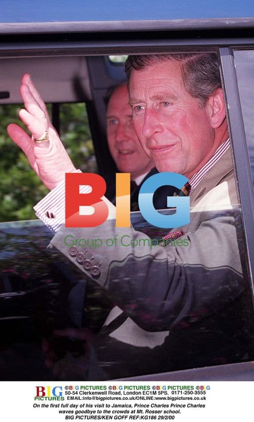 Prince Charles waves goodbye at Jamaican school