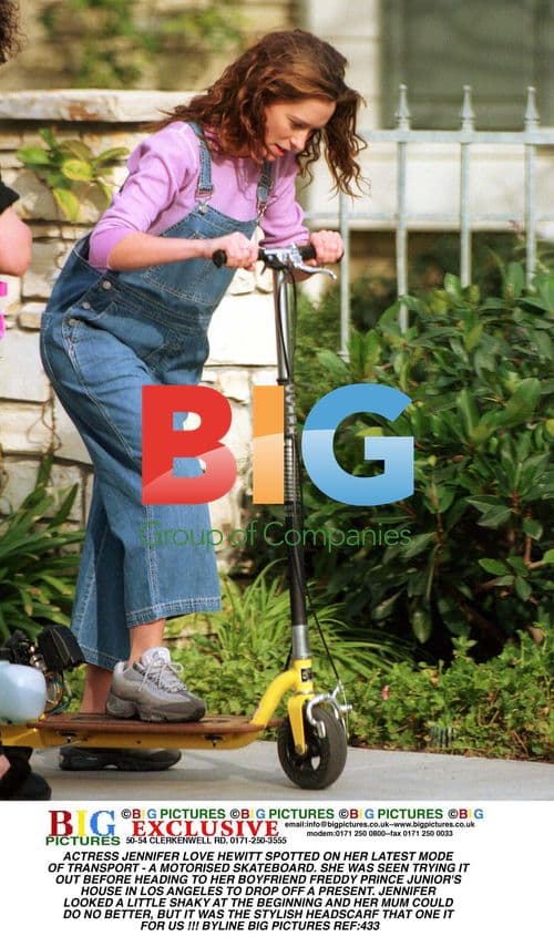 Jennifer Love Hewitt Rides Motorized Skateboard